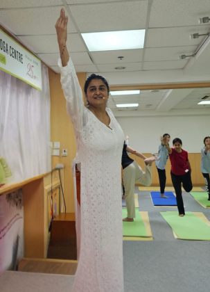 Classical yoga instructor leading class